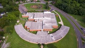 Restoration House Family Worship Center, website graphic showing an aerial drone overhead view from about 400 feet above the church